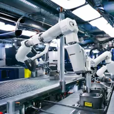 Using joint-arm robots to improve quality in consumer-goods stamping