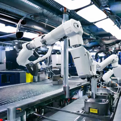 Using joint-arm robots to improve quality in consumer-goods stamping